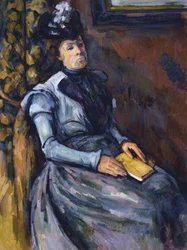 Sitzende Frau in Blau